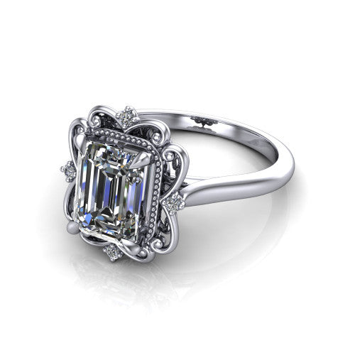 Gracelynn emerald floral halo engagement ring in 18K White Gold with ornate filigree halo and plain band, three-quarter perspective view
