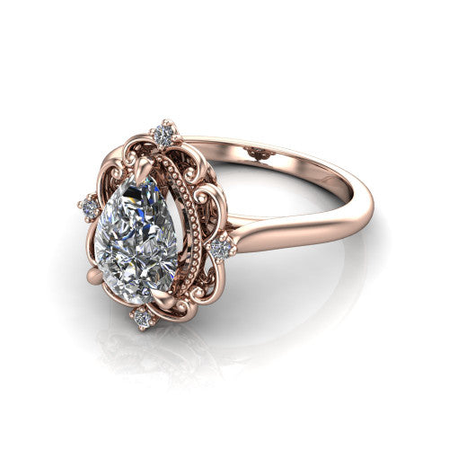 Gracelynn pear floral halo engagement ring in 18K Rose Gold with ornate filigree halo and plain band, three-quarter perspective view