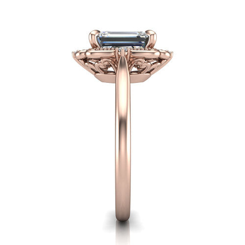 Gracelyn emerald halo engagement ring in 18K Rose Gold, side profile showing the carved scrollwork halo frame and the polished band