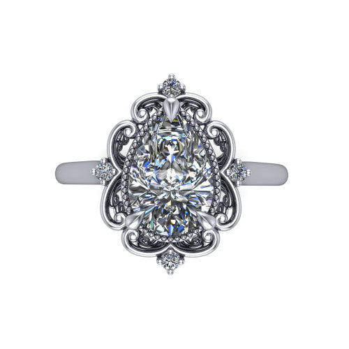 Gracelyn pear halo engagement ring in Platinum, top-down view showing the center diamond within an open carved filigree halo with fleur-de-lis corners