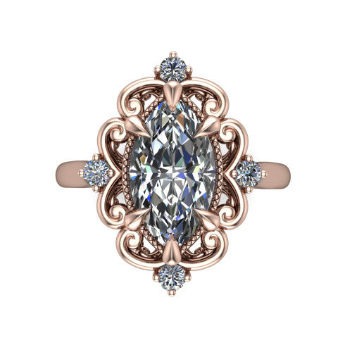Gracelyn marquise halo engagement ring in 14K Rose Gold, top-down view showing the center diamond within an open carved filigree halo with fleur-de-lis corners