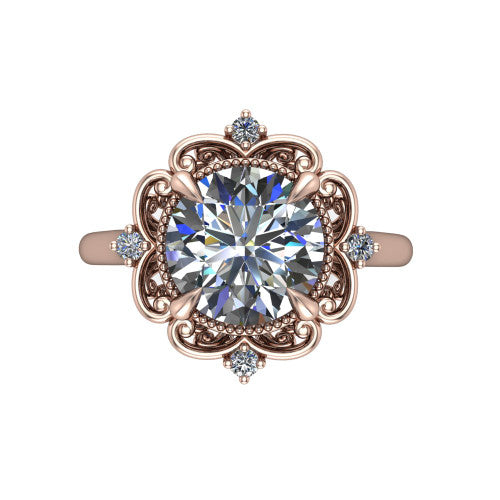 Gracelyn round halo engagement ring in 18K Rose Gold, top-down view showing the center diamond within an open carved filigree halo with fleur-de-lis corners