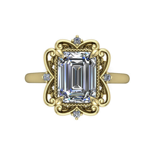 Gracelyn emerald halo engagement ring in 18K Yellow Gold, top-down view showing the center diamond within an open carved filigree halo with fleur-de-lis corners