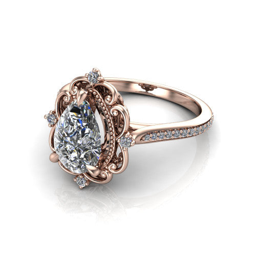 Remington pear vintage halo engagement ring in 14K Rose Gold with ornate floral filigree halo and pavé band, three-quarter perspective view