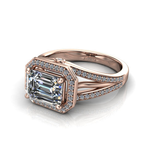 Brinley emerald vintage halo engagement ring in 14K Rose Gold with bezel-edged milgrain halo and pavé split shank, three-quarter perspective view