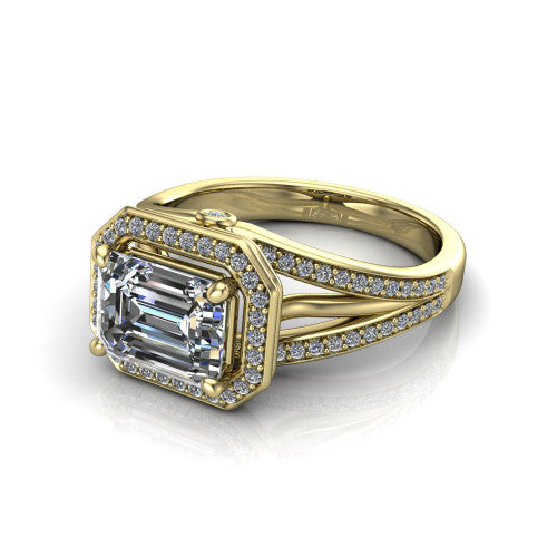 Brinley emerald vintage halo engagement ring in 14K Yellow Gold with bezel-edged milgrain halo and pavé split shank, three-quarter perspective view