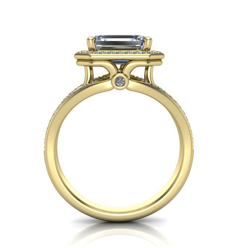 Brinley emerald vintage halo engagement ring in 18K Yellow Gold with bezel-edged milgrain halo and pavé split shank, through-finger front profile showing the bezel-set accent