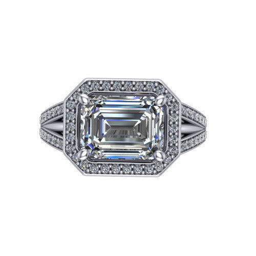 Brinley emerald vintage halo engagement ring in 18K White Gold with bezel-edged milgrain halo and pavé split shank, top-down view of the bezel-framed pavé halo