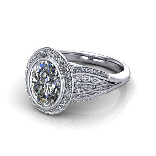 Meadow oval vintage halo engagement ring in Platinum with diagonal pavé halo and engraved filigree band, three-quarter perspective view