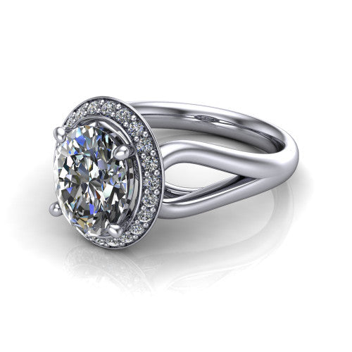 Daleyza oval halo engagement ring in 14K White Gold, three-quarter perspective showing the oval center diamond, pave halo, and polished split-shank band
