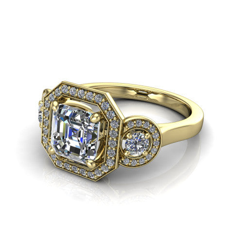 Colette square emerald-cut three-stone halo engagement ring in 18K Yellow Gold, three-quarter perspective showing the square emerald-cut center diamond and two round side stones, each in a pave halo, across the band