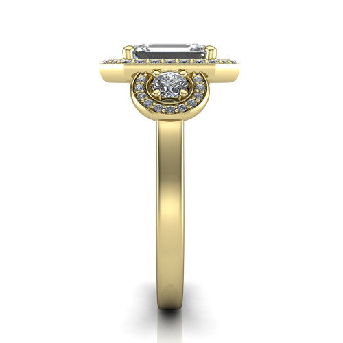 Colette emerald-cut three-stone halo engagement ring in 18K Yellow Gold, side profile showing the three pave halos and polished band in profile