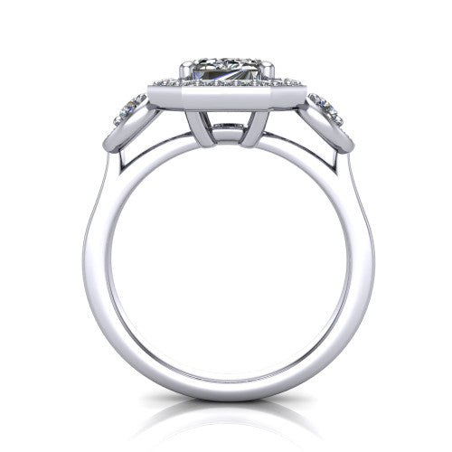 Colette emerald-cut three-stone halo engagement ring in Platinum, through-finger front profile showing the haloed stones and open under-gallery from the front