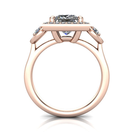 Colette princess-cut three-stone halo engagement ring in 14K Rose Gold, through-finger front profile showing the haloed stones and open under-gallery from the front