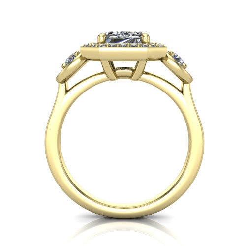 Colette emerald-cut three-stone halo engagement ring in 14K Yellow Gold, through-finger front profile showing the haloed stones and open under-gallery from the front