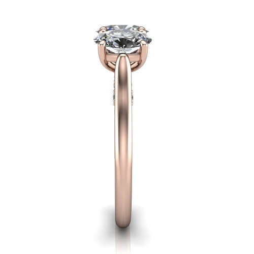 Kora oval three-stone engagement ring in 18K Rose Gold, side profile showing the pave-set band, scrollwork gallery, and high-polish profile