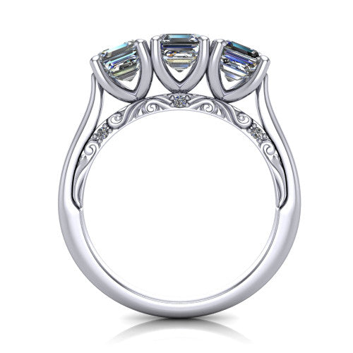 Kora square emerald-cut three-stone engagement ring in Platinum, through-finger front profile showing the open scrollwork under-gallery and pave-set accents