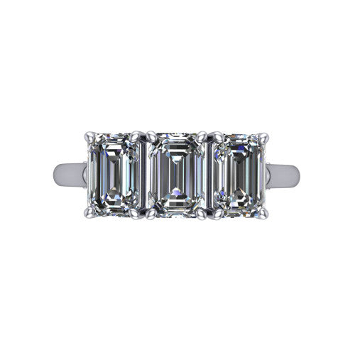 Kora emerald-cut three-stone engagement ring in Platinum, top-down view showing the three matched emerald-cut diamonds set side by side across the band