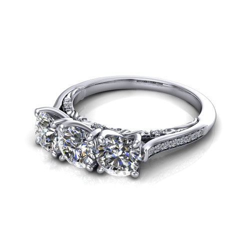 Emory round three-stone engagement ring in Platinum, three-quarter perspective showing the three matched round diamonds, pave-set band, and filigree under-gallery