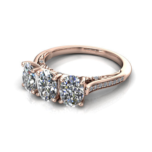 Emory oval three-stone engagement ring in 14K Rose Gold, three-quarter perspective showing the three matched oval diamonds, pave-set band, and filigree under-gallery