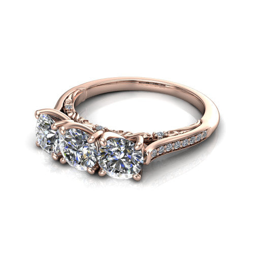 Emory round three-stone engagement ring in 14K Rose Gold, three-quarter perspective showing the three matched round diamonds, pave-set band, and filigree under-gallery