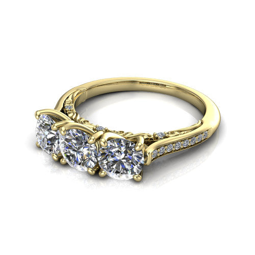 Emory round three-stone engagement ring in 14K Yellow Gold, three-quarter perspective showing the three matched round diamonds, pave-set band, and filigree under-gallery