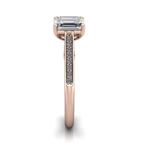 Emory emerald-cut three-stone engagement ring in 18K Rose Gold, side profile showing the pave-set band, filigree gallery, and high-polish profile