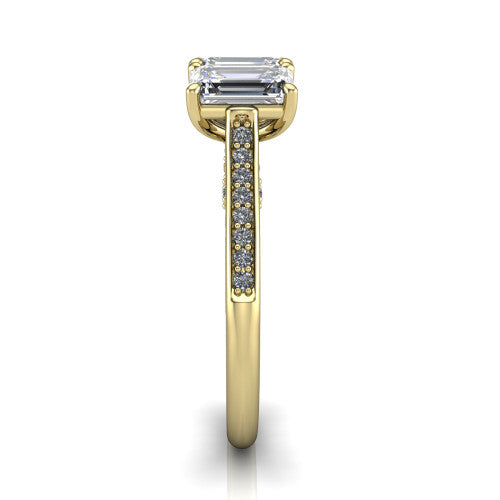 Emory emerald-cut three-stone engagement ring in 14K Yellow Gold, side profile showing the pave-set band, filigree gallery, and high-polish profile