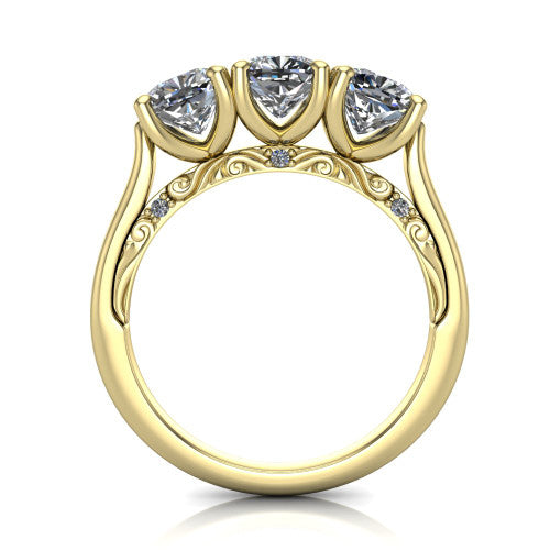 Emory cushion three-stone engagement ring in 18K Yellow Gold, through-finger front profile showing the open filigree under-gallery and pave-set shoulders