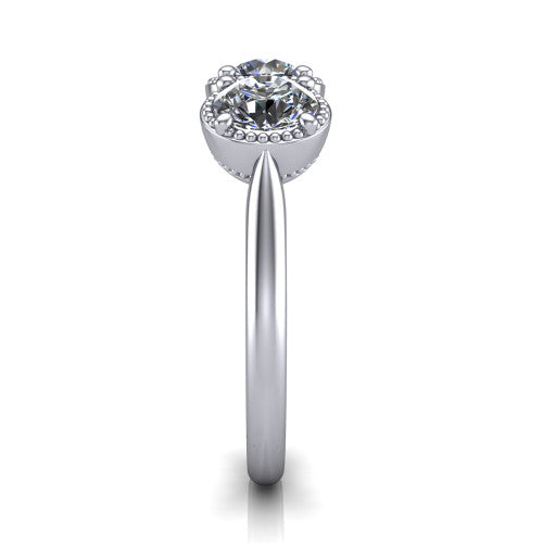 Evangeline round three-stone engagement ring in 14K White Gold, side profile showing the milgrain bezels and clean polished band in profile