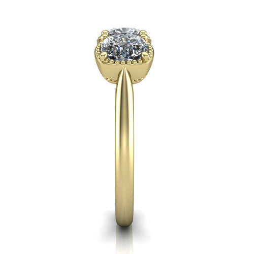 Evangeline cushion three-stone engagement ring in 14K Yellow Gold, side profile showing the milgrain bezels and clean polished band in profile