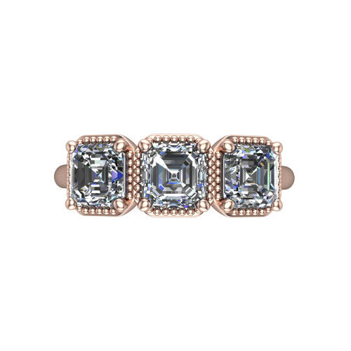 Evangeline square emerald-cut three-stone engagement ring in 18K Rose Gold, top-down view showing the three square emerald-cut diamonds set side by side in milgrain bezels
