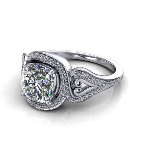 Elisa cushion vintage halo engagement ring in Platinum, three-quarter perspective showing the cushion center diamond, pave halo, and vintage filigree heart-scroll shoulders