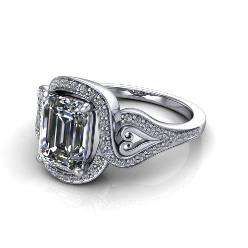 Elisa emerald-cut vintage halo engagement ring in 14K White Gold, three-quarter perspective showing the emerald-cut center diamond, pave halo, and vintage filigree heart-scroll shoulders