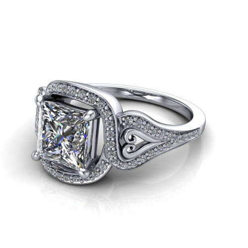Elisa princess-cut vintage halo engagement ring in Platinum, three-quarter perspective showing the princess-cut center diamond, pave halo, and vintage filigree heart-scroll shoulders
