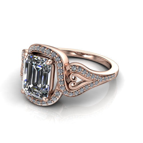 Elisa emerald-cut vintage halo engagement ring in 18K Rose Gold, three-quarter perspective showing the emerald-cut center diamond, pave halo, and vintage filigree heart-scroll shoulders