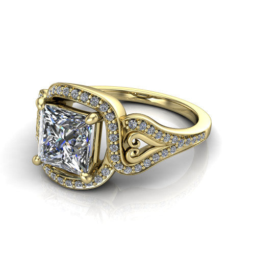 Elisa princess-cut vintage halo engagement ring in 18K Yellow Gold, three-quarter perspective showing the princess-cut center diamond, pave halo, and vintage filigree heart-scroll shoulders
