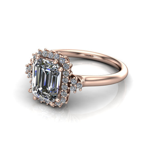 Elaine emerald-cut floral halo engagement ring in 14K Rose Gold, three-quarter perspective showing the emerald-cut center diamond framed by the floral pave halo and shoulder accents