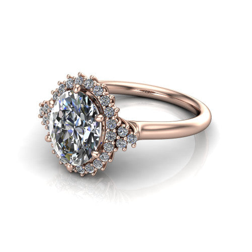 Elaine oval floral halo engagement ring in 14K Rose Gold, three-quarter perspective showing the oval center diamond framed by the floral pave halo and shoulder accents