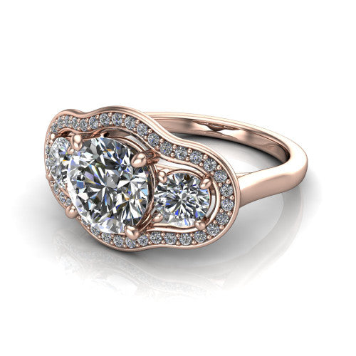 Makayla round three-stone halo engagement ring in 18K Rose Gold, three-quarter perspective showing the round center diamond, two side stones, and individual pave halos on the east-west gallery