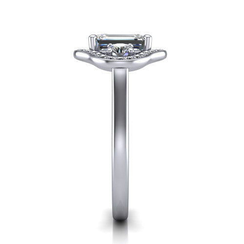 Makayla emerald-cut three-stone halo engagement ring in 14K White Gold, side profile showing the cathedral rise, pave halos, and high-polish band