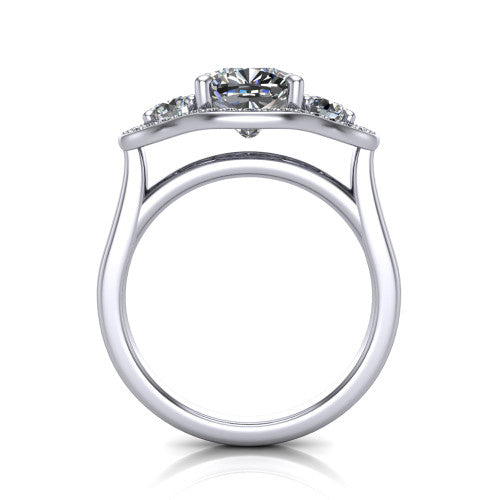 Makayla cushion three-stone halo engagement ring in Platinum, through-finger front profile showing the open cathedral under-gallery and the trio of pave halos