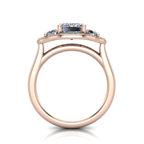 Makayla emerald-cut three-stone halo engagement ring in 14K Rose Gold, through-finger front profile showing the open cathedral under-gallery and the trio of pave halos
