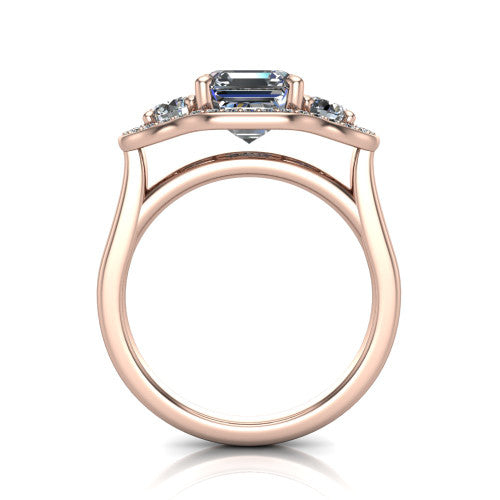 Makayla square emerald-cut three-stone halo engagement ring in 14K Rose Gold, through-finger front profile showing the open cathedral under-gallery and the trio of pave halos