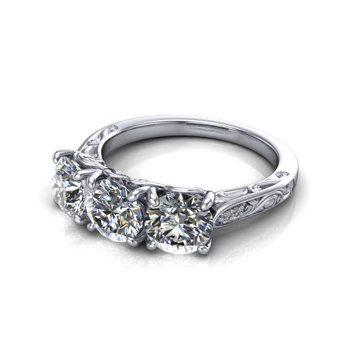 Navy round three stone engagement ring in 14K White Gold, three-quarter perspective showing three round diamonds above an engraved filigree band