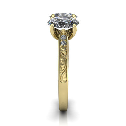 Navy oval three stone engagement ring in 14K Yellow Gold, side profile showing the vintage engraved filigree band and the raised three-stone setting