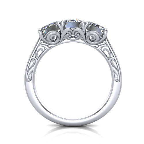 Navy emerald three stone engagement ring in Platinum, through-finger front profile showing the filigree scroll gallery beneath the three stones