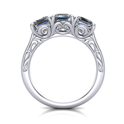 Navy square emerald three stone engagement ring in 18K White Gold, through-finger front profile showing the filigree scroll gallery beneath the three stones