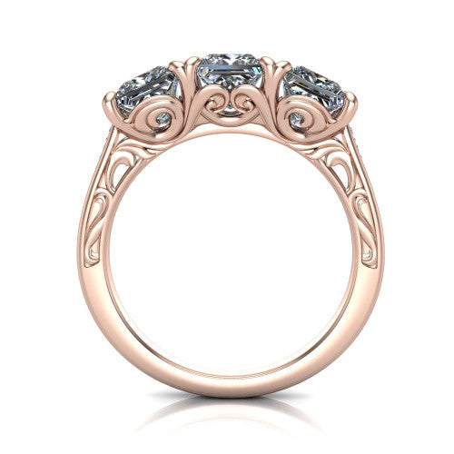 Navy princess three stone engagement ring in 18K Rose Gold, through-finger front profile showing the filigree scroll gallery beneath the three stones
