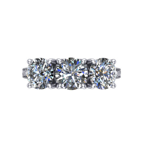 Navy round three stone engagement ring in Platinum, top-down view showing the trio of round stones set in a row